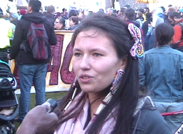 [Native American woman at protest]